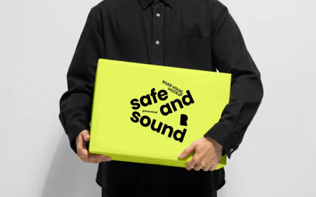 Regular Cardboad Box Mockup with Man Standing