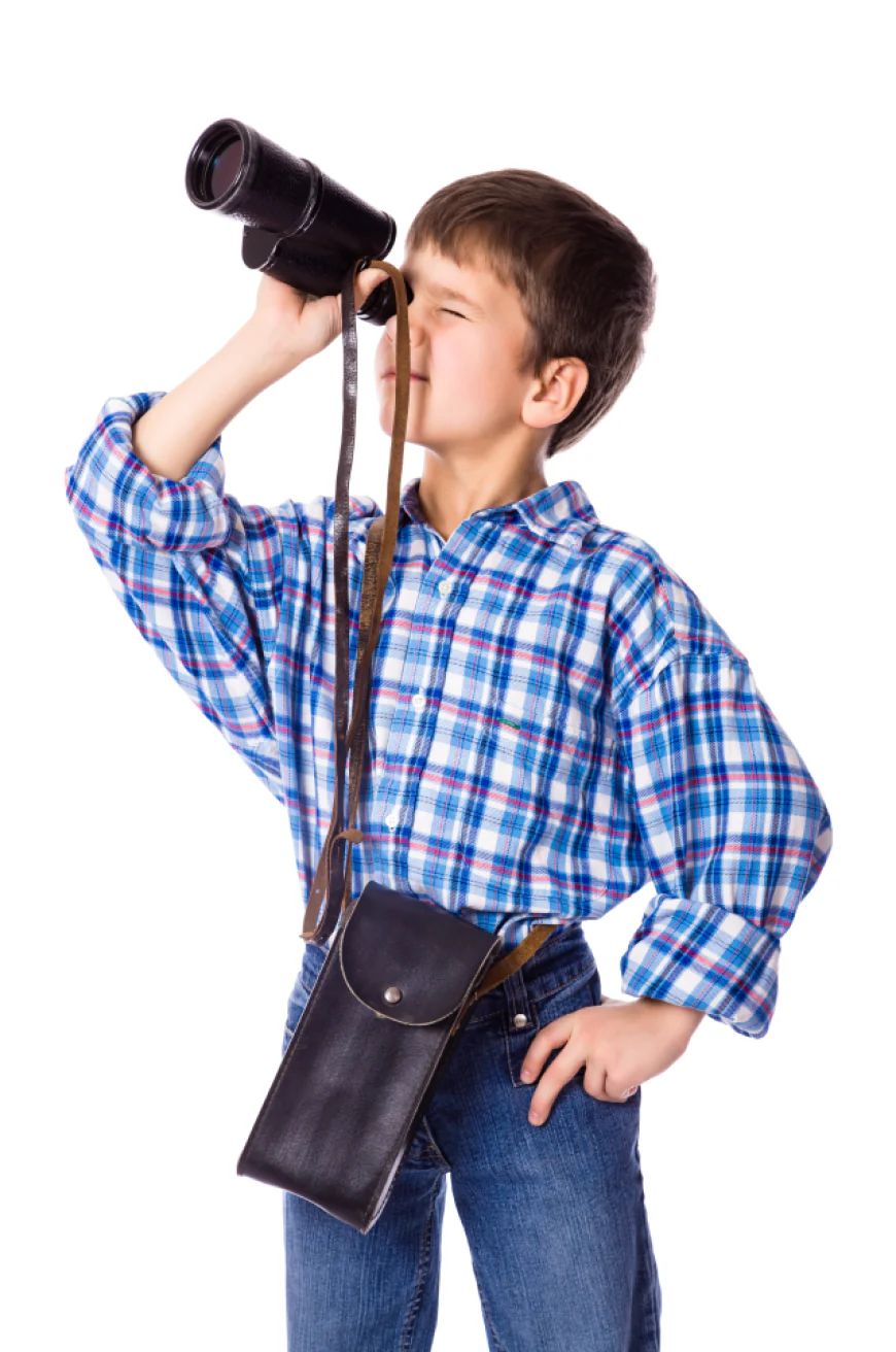 Boy with binoculars, concept of discovering new knowledge photo free download